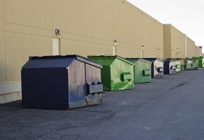 heavy-duty roll-off dumpsters outside a construction zone in Blue Springs MO